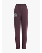 burgundy sweatpants with the text favorite daughter on the side of the leg