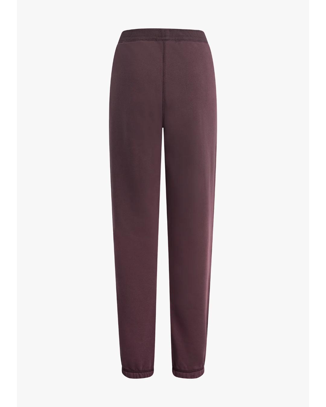 burgundy sweatpants with the text favorite daughter on the side of the leg