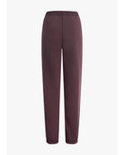 burgundy sweatpants with the text favorite daughter on the side of the leg