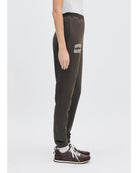 sweatpants in a brown with the text favorite daughter on the leg