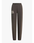 sweatpants in a brown with the text favorite daughter on the leg