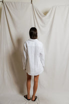 white linen blouse button down