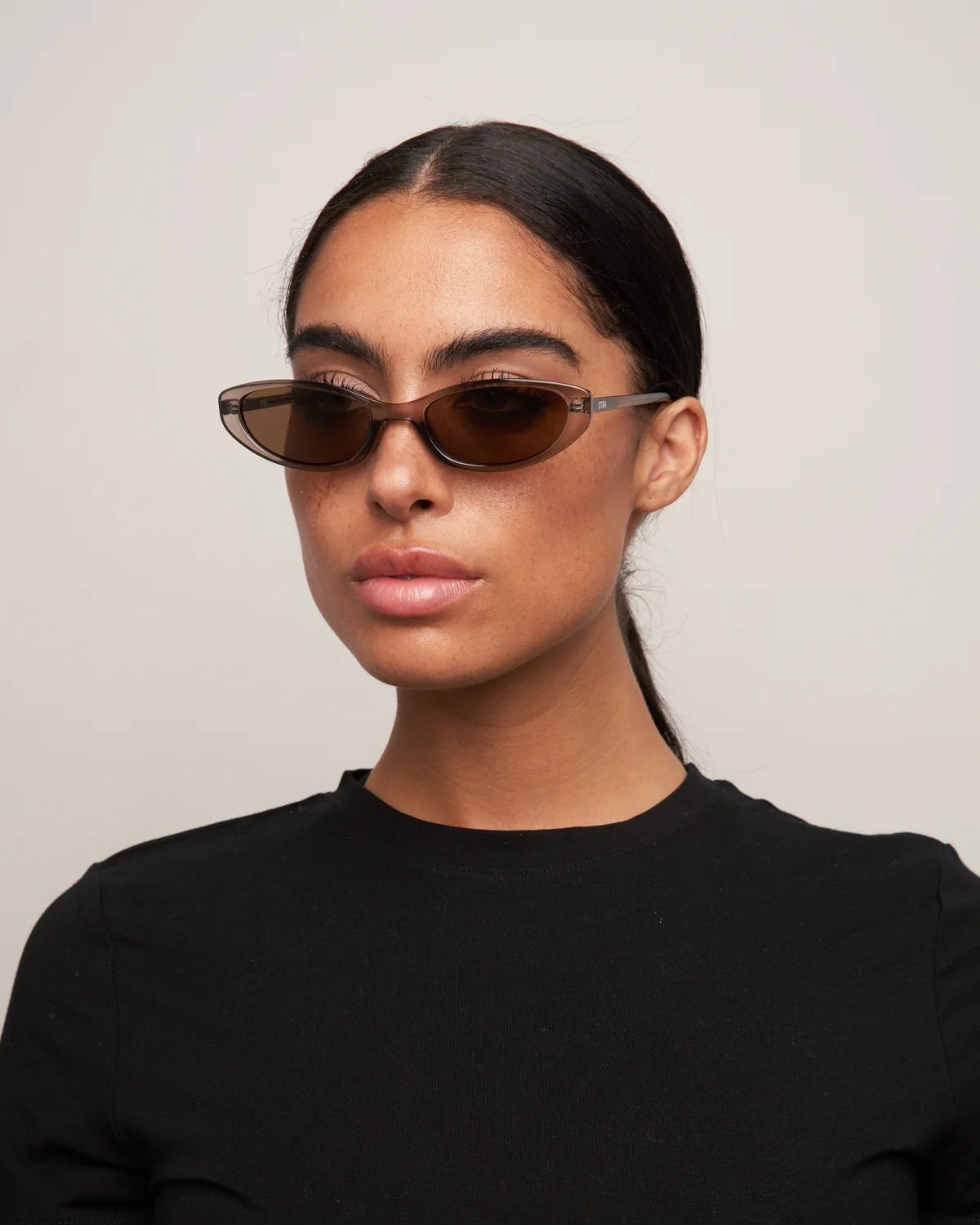 cat eye sunglasses with a brown transparent frame