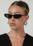 black oval sunglasses