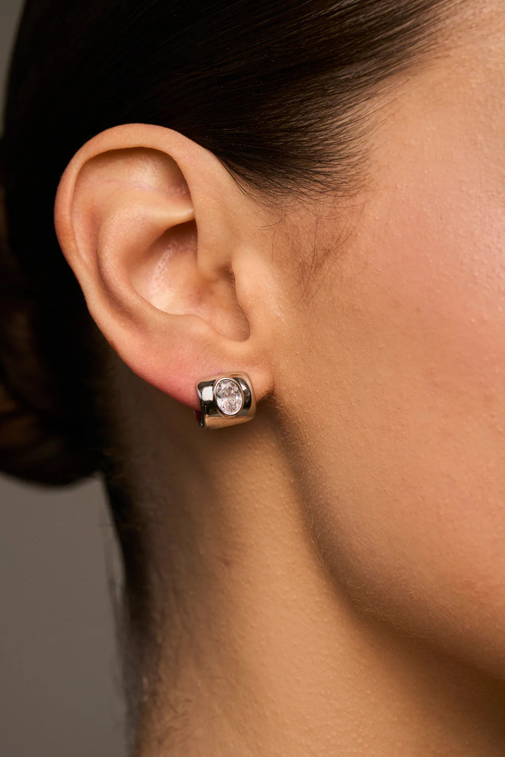 silver small hoop with diamond in the middle
