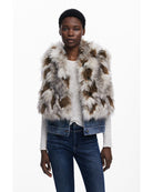 fur vest with denim on the bottom