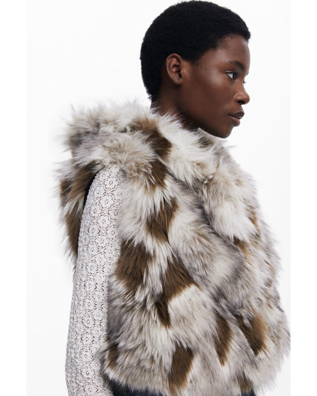 fur vest with denim on the bottom