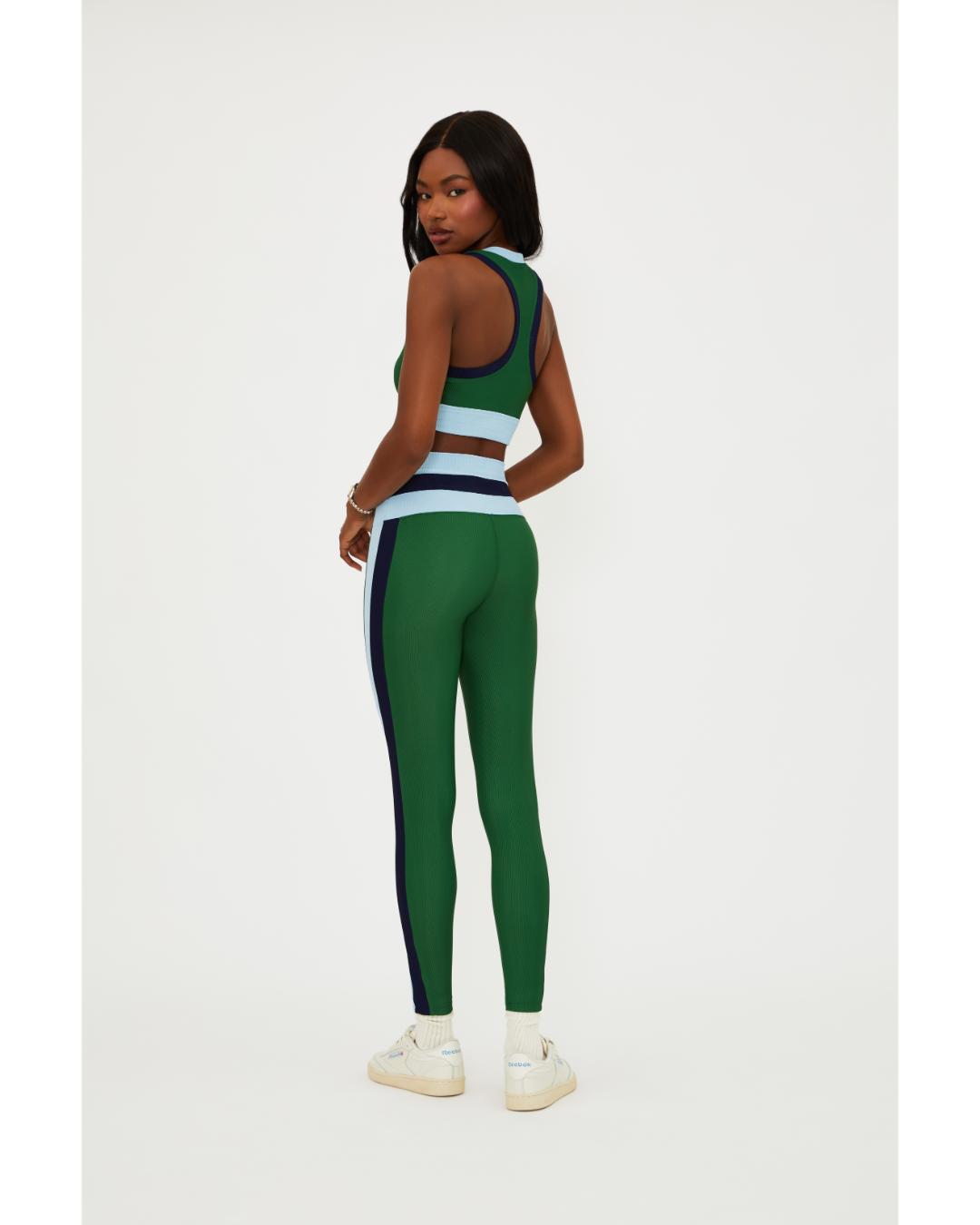 green leggings with a blue and navy stripe down the side