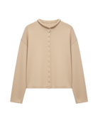 beige cardigan with a rolled hem