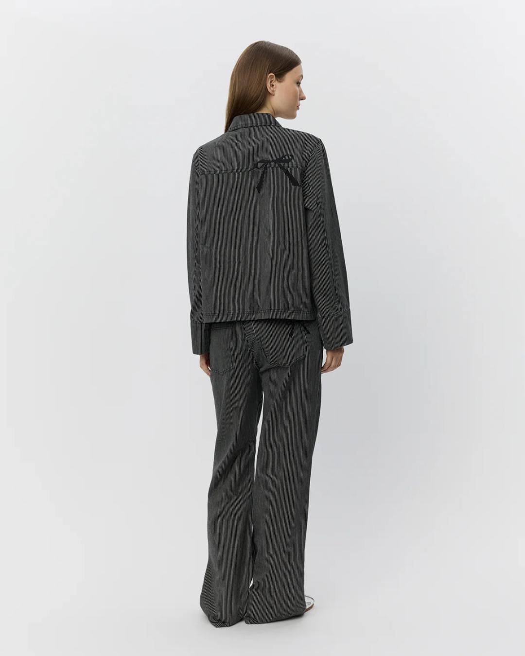 black striped jacket that ties in the front
