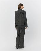 black striped jacket that ties in the front