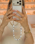 blue bead and pearl phone wristlet