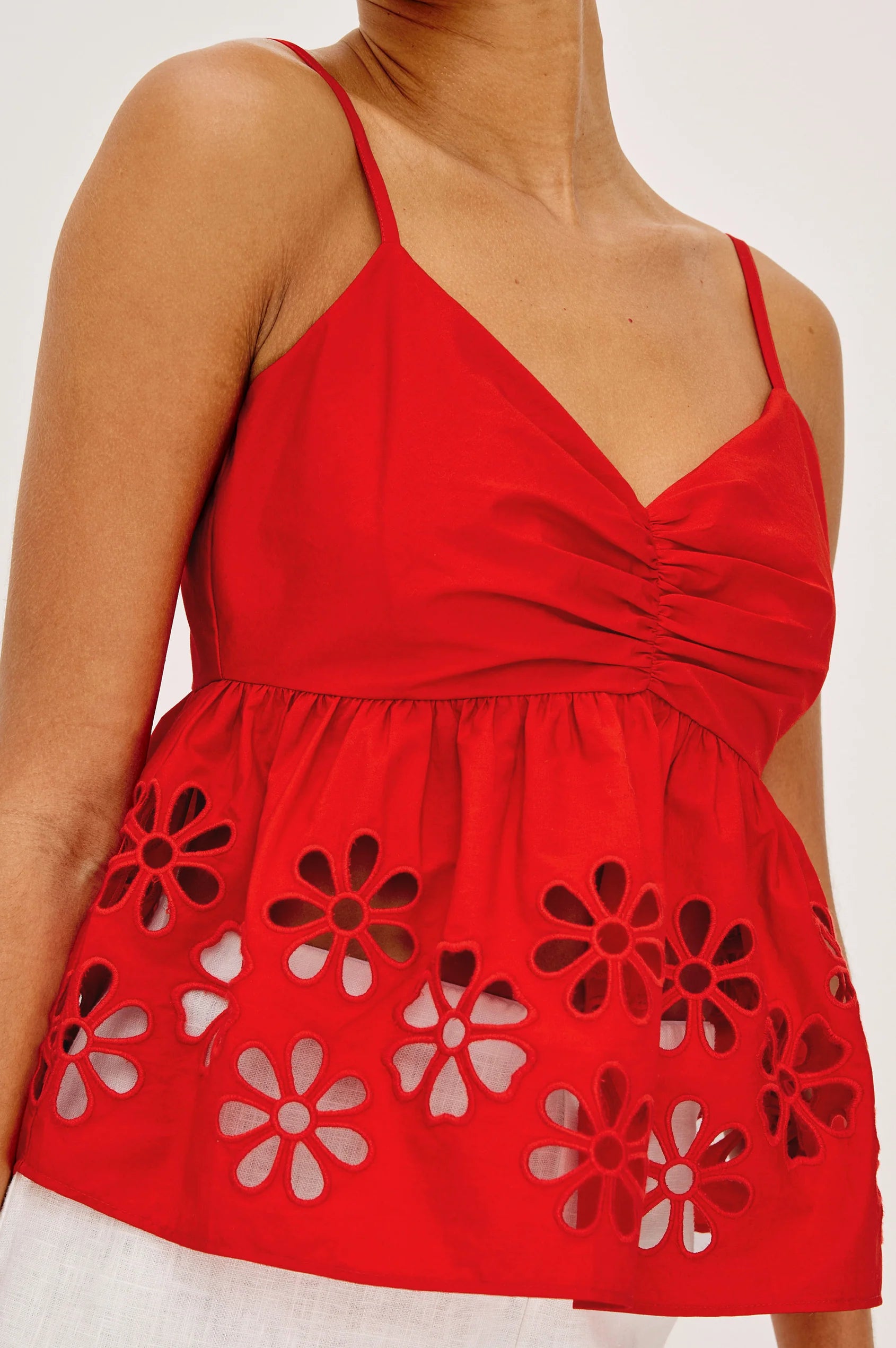 red tank top with eyelet detail