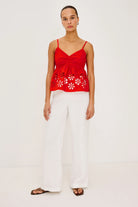 red tank top with eyelet detail