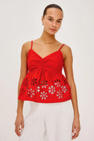 red tank top with eyelet detail