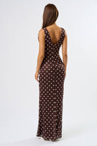 back view of maxi dress in brown with white polka dots