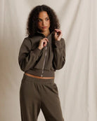 green zip up sweatshirt