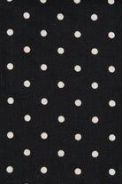 black maxi dress with cream polka dots