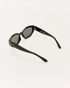 black sunglasses with grey lenses 