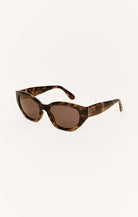 brown oval tortoise sunglasses