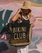 beach bag in cream and black with text beach club