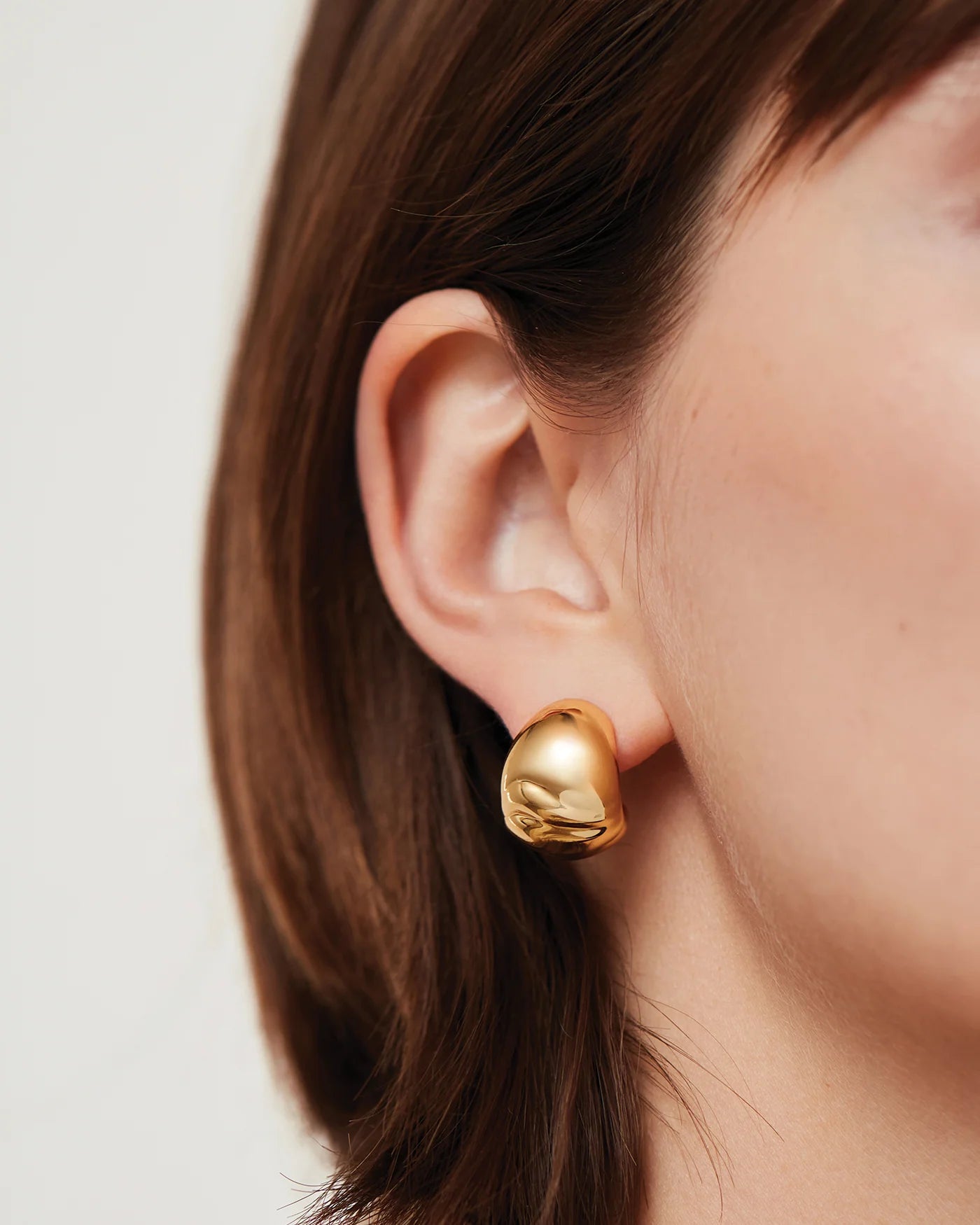 gold statement earrings