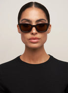 oversizes sunglasses with a brown frame and lenses