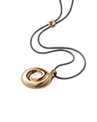 black rope necklace with a large gold pendant 