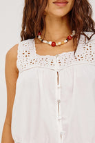white tank top with eyelet details