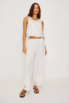 white tank top with eyelet details