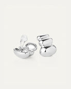 statement silver clip on earrings