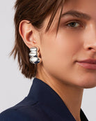 statement silver clip on earrings