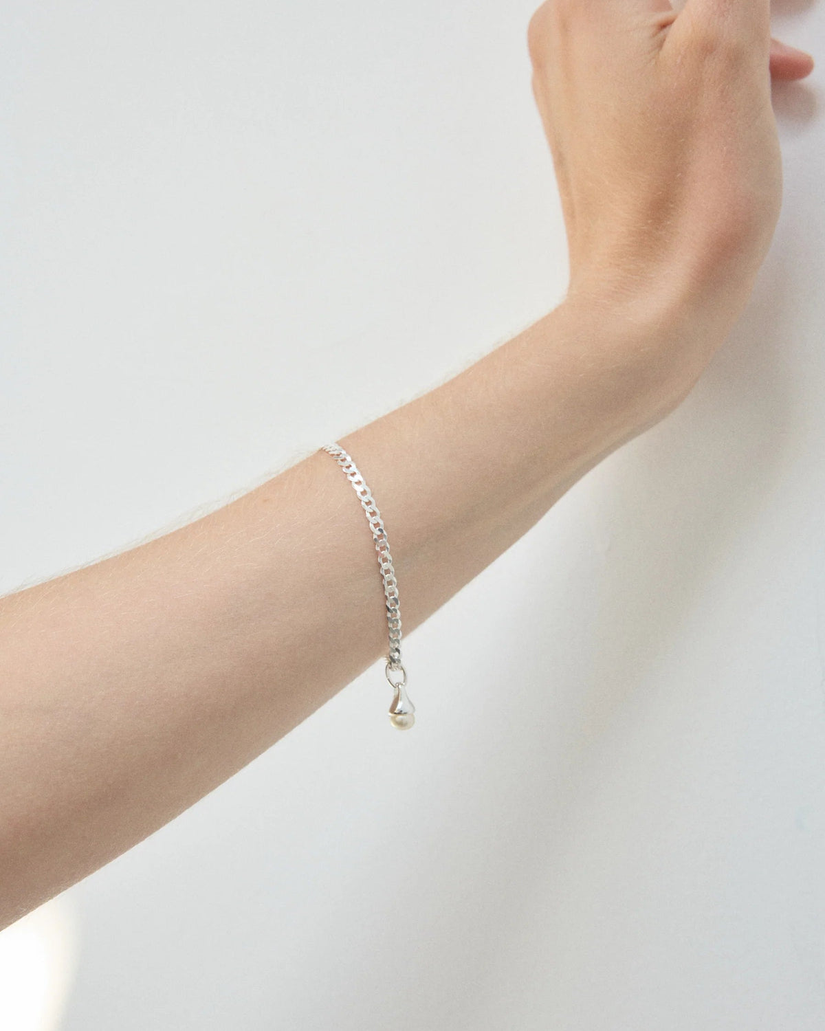silver bracelet with pearl charm