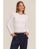 long sleeve shirt in white with grey on bottom and sleeves