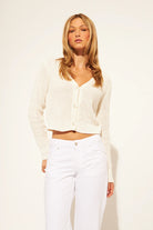 knit cardigan in white with pearl buttons