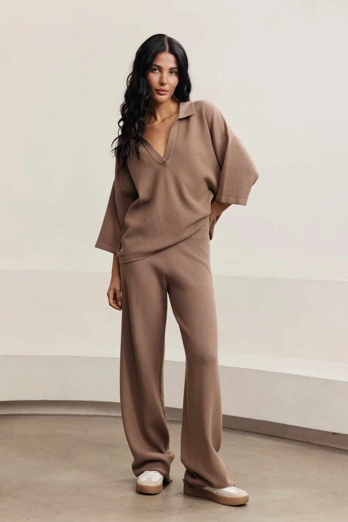 t-shirt in light brown with a v-neck and collar