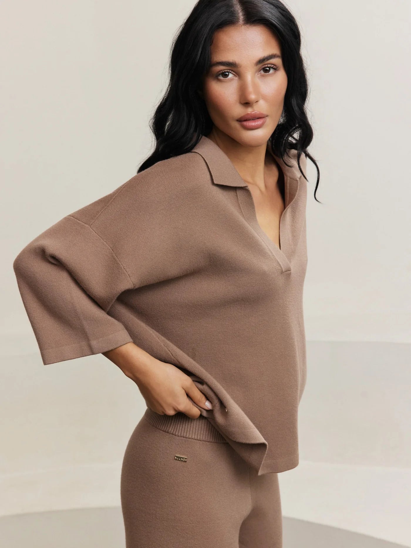 t-shirt in light brown with a v-neck and collar