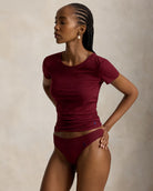 a mid rise cotton thong by polo ralph lauren in a dark burgundy colour