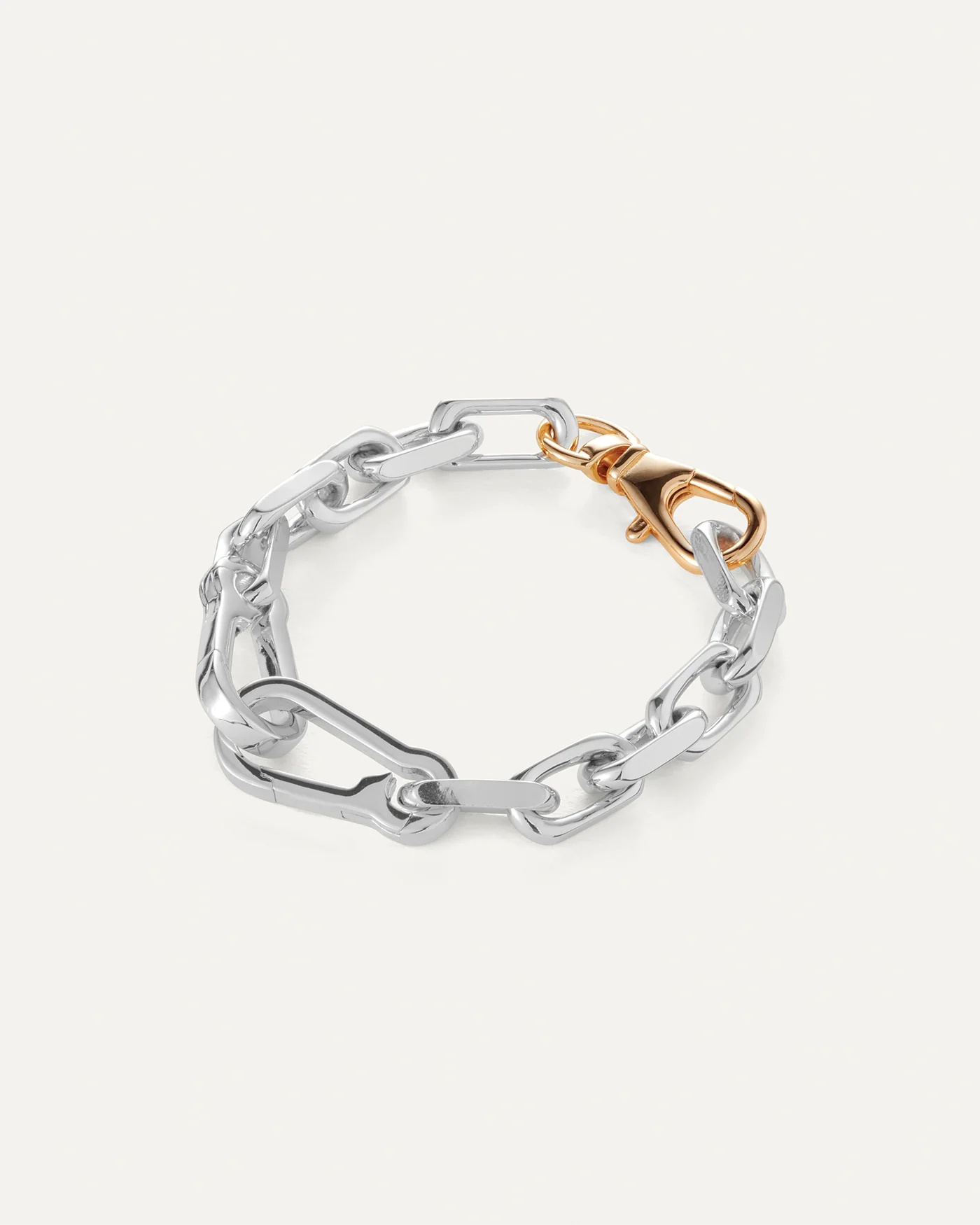 two toned statement chain link bracelet with a heart pendant 