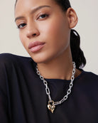 two tone statement link necklace with heart pendant 
