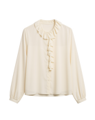 cream blouse with a ruffle collar