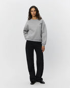 black relaxed jean with rhinestones all over