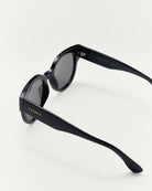 black sunglasses with grey lenses 