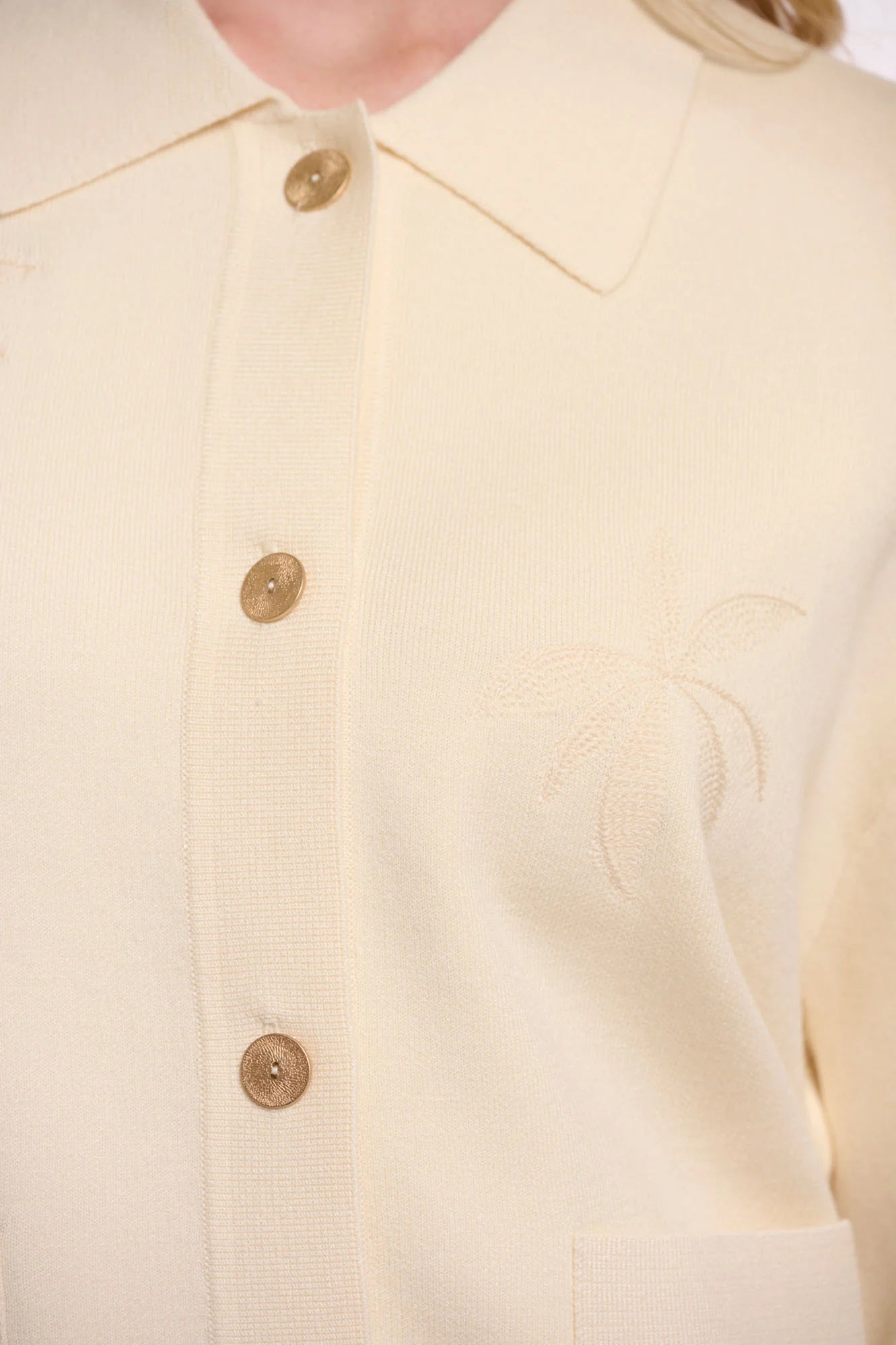 cream cardigan with a collar