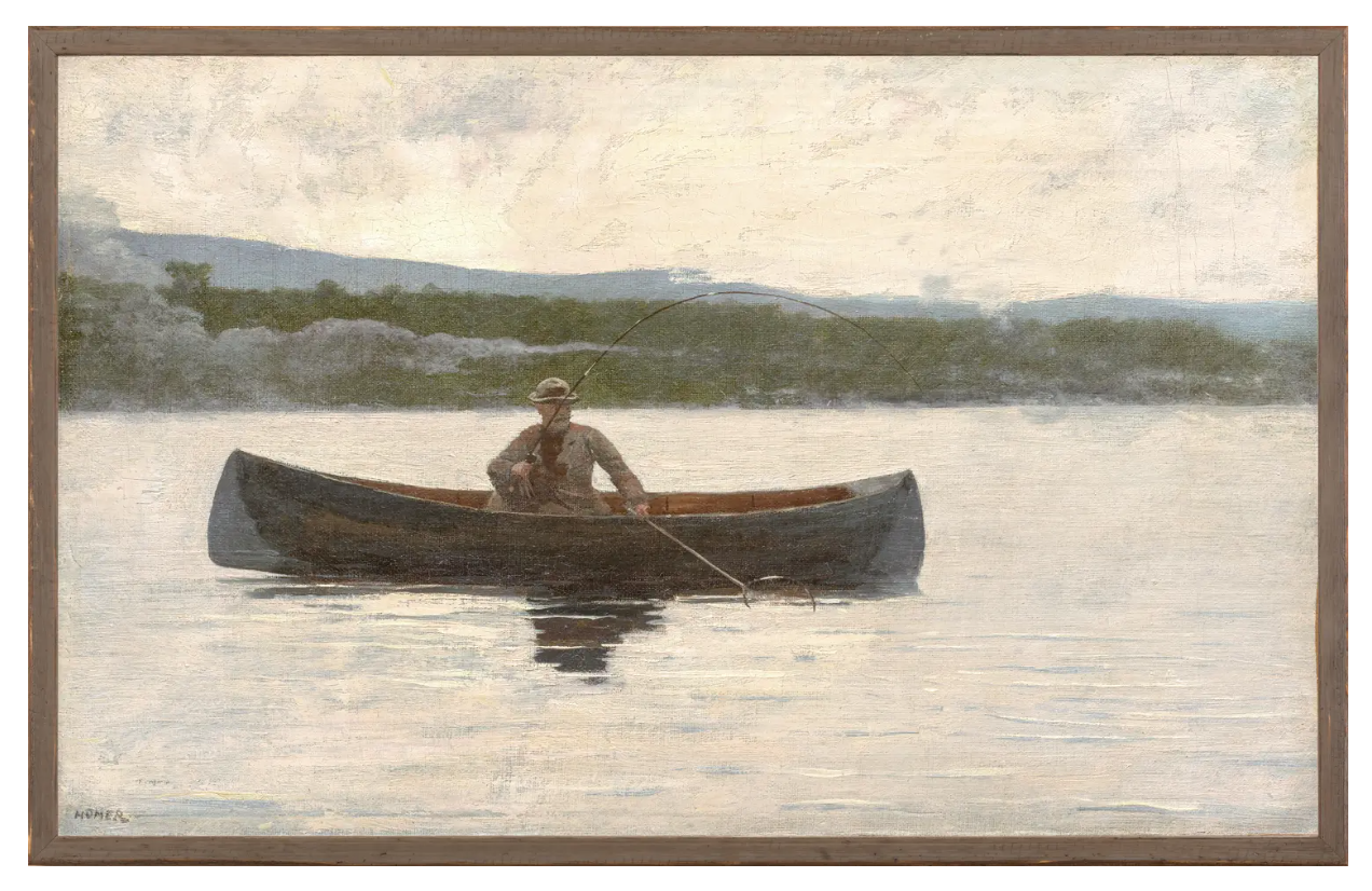 framed art of a man in a canoe fishing