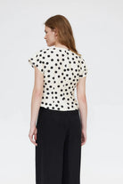 black and white polka dot top