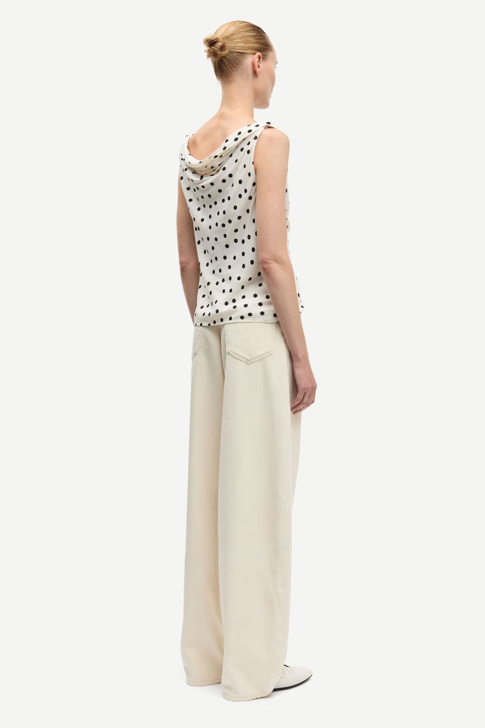cream tank with black polka dots
