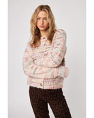 knit cardigan in with some pink, orange, red and brown in it