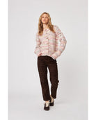knit cardigan in with some pink, orange, red and brown in it
