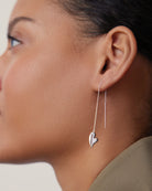 silver threader earrings with a heart on the bottom